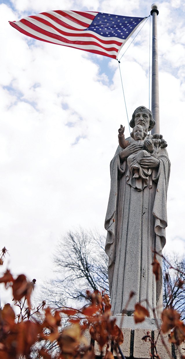 Statue of St. Joseph and the child Jesus, outside St. Joseph Church in Martinsburg.